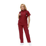 Alison Four-Pocket Scrub Top with mandarin collar and functional design.