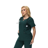 Anne V-neck Four-Pocket Scrub Top featuring a unique cross design and functional pockets.