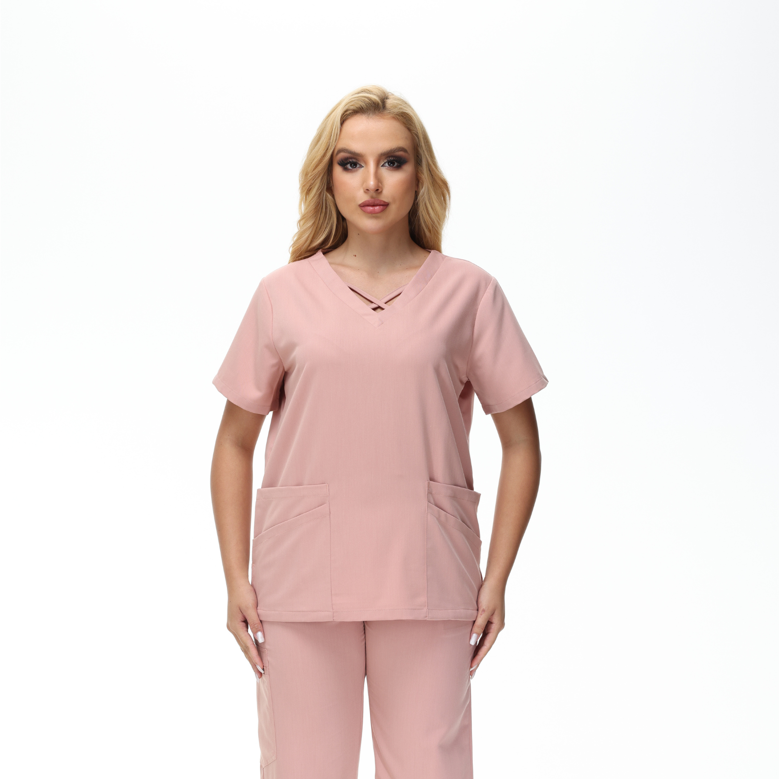 Anne V-neck Four-Pocket Scrub Top featuring a unique cross design and functional pockets.